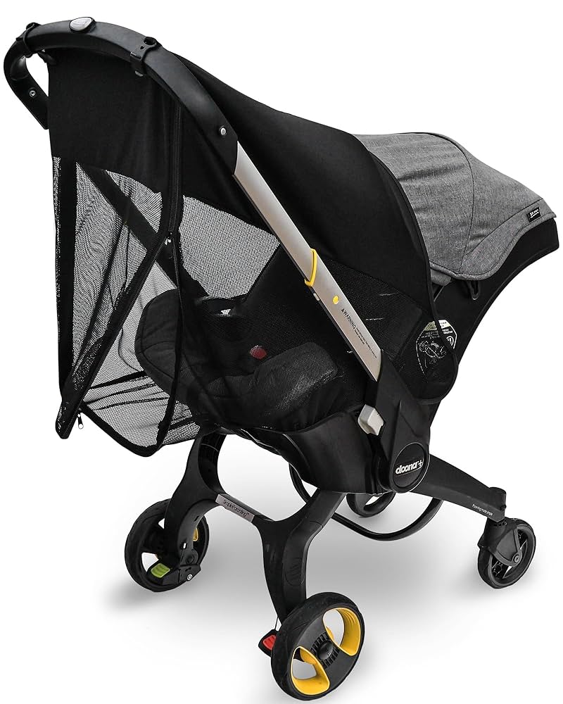 doona ベビーカー＋ISOFIXベース＋サンシェード＋Wheelカバー raincover1.jpg